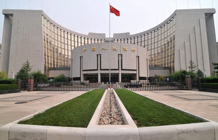 Народный банк Китая сократил базовую процентную ставку на 0,25% - ảnh 1